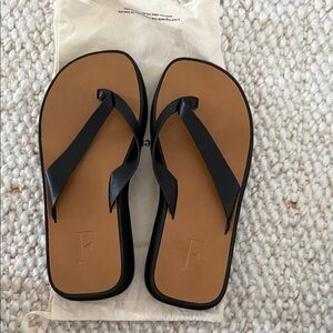 Flattered Black and Tan Sandals